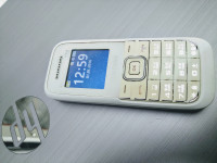 White Samsung  Guru FM plus