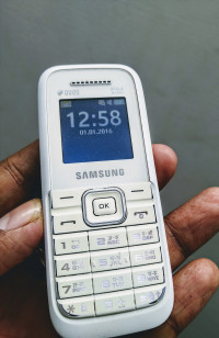 White Samsung  Guru FM plus