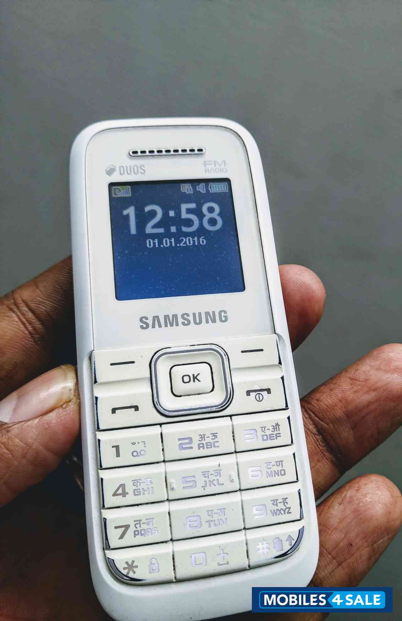 White Samsung  Guru FM plus