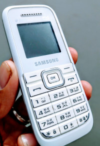 White Samsung  Guru FM plus