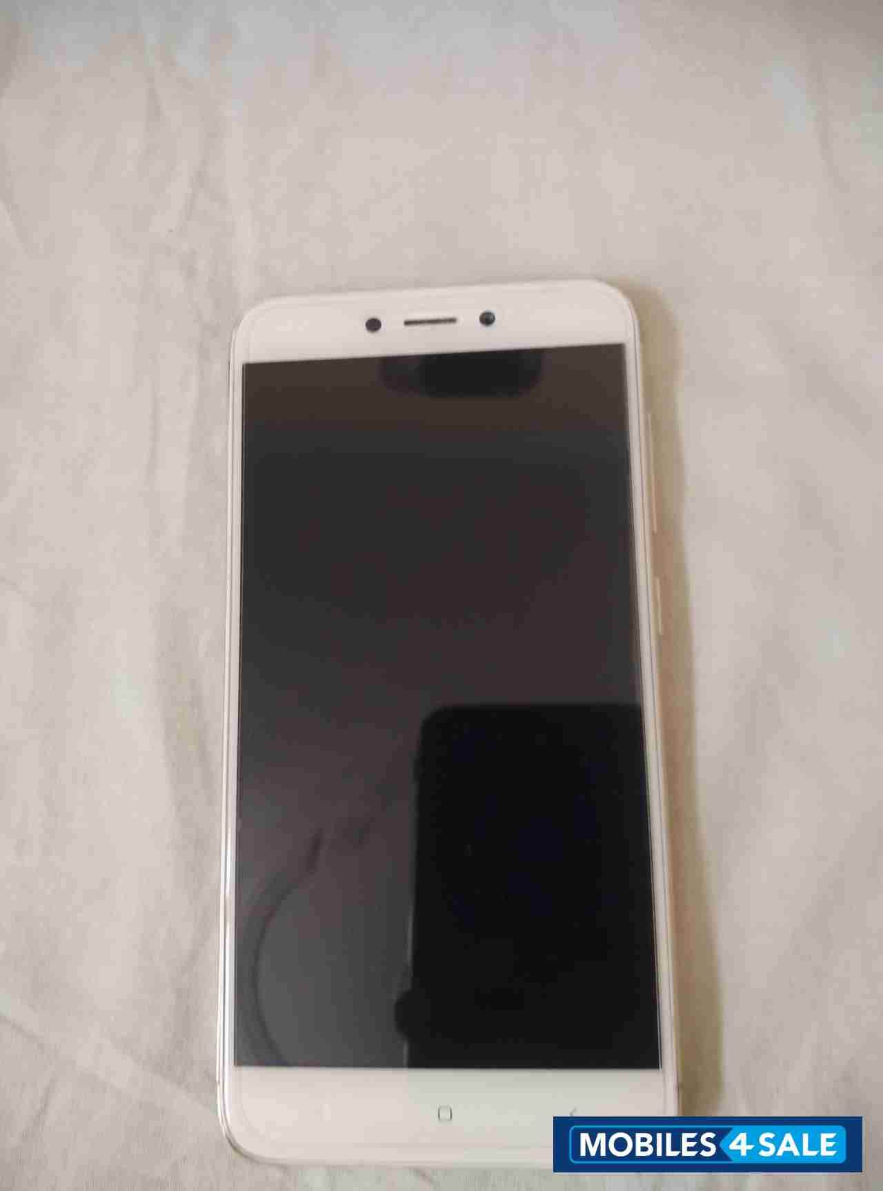 White Redmi  Redmi 4