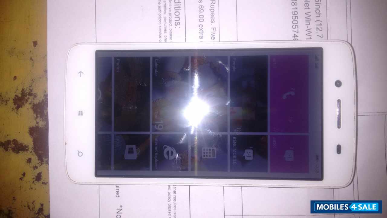 White Micromax Canvas Win W121