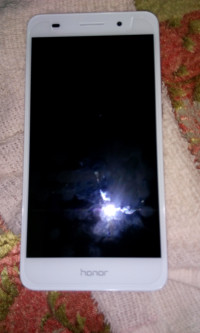 White Huawei Honor Holly 3