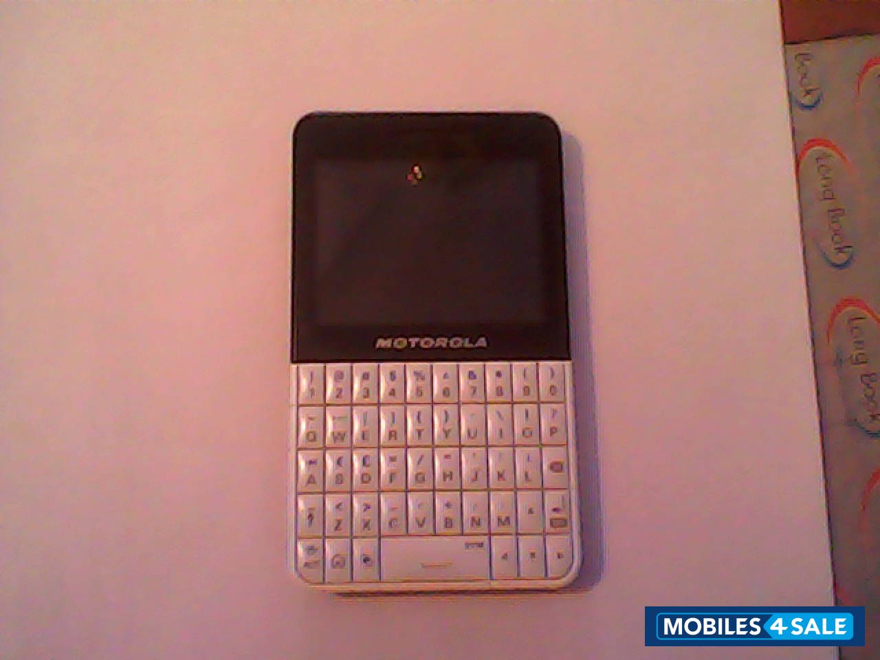 White & Black Motorola EX119