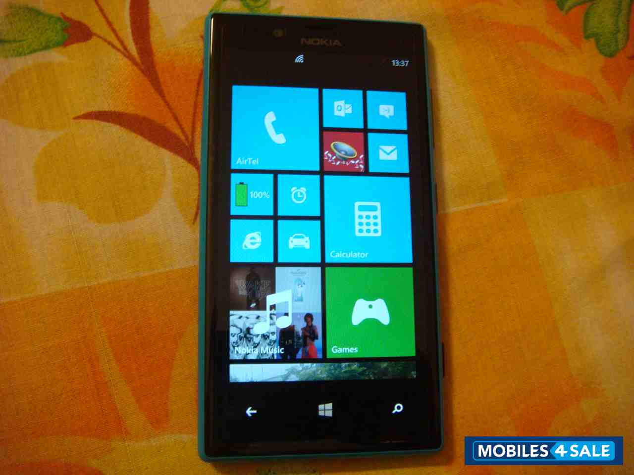 Cyan Nokia Lumia 720