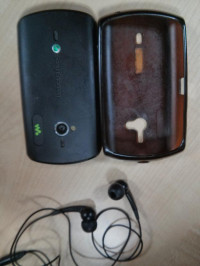 Black Sony Ericsson WT19i live with walkman