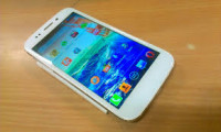 White Micromax Canvas 4 A210